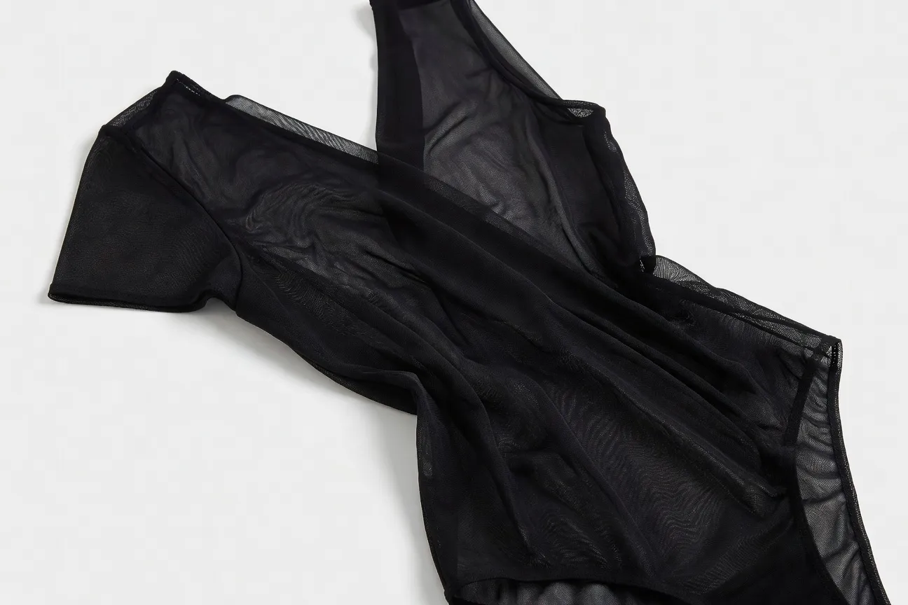 Black mesh bodysuit — elegant and refined